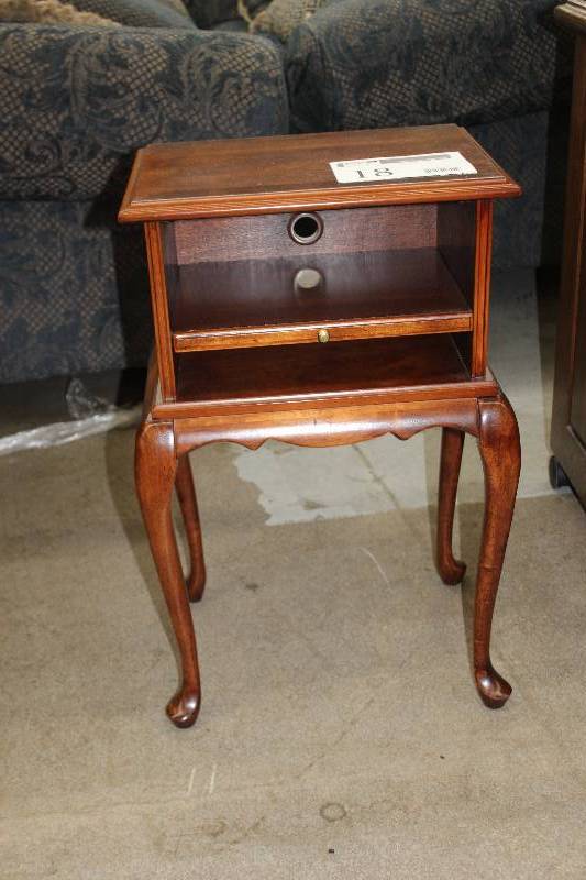 lot 18 image: 4-Leg 1-Shelf Wood Entertainment Cabinet