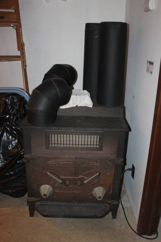 lot 10 image: Country Flame Metal Wood Burning Stove