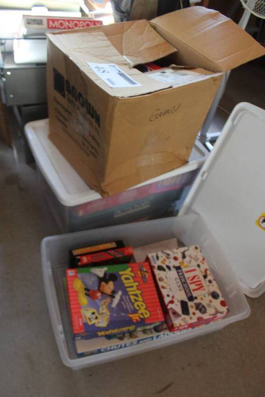 lot 48 image: Lot of (2) Boxes of Vintage Board Games Includes Yahtzee, I Spy, Pictionary, Monopoly, Battleship, Tiddly Winks, And More