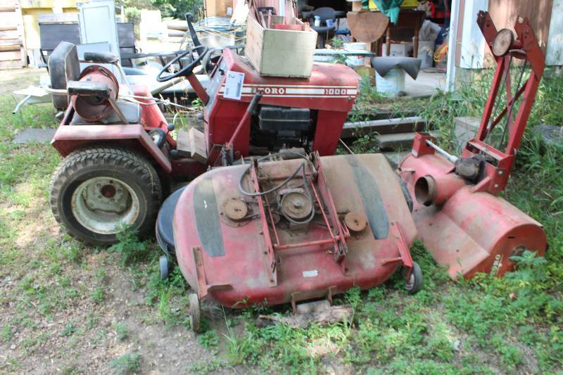lot 2 image: Toro 1000 Rider Lawn Mower w 2 Attachments For Mowing, Snow Removal