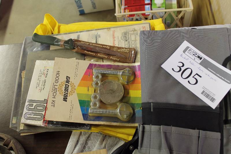 lot 305 image: Bucket Holder, Knives, Yellow Pants