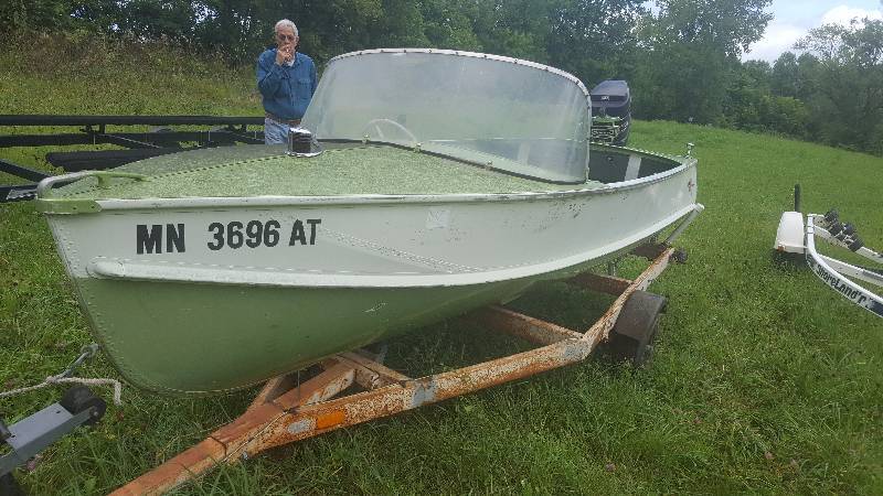 lot 1A image: 1956 14 Foot Crestliner With 50HP Outboard Motor  and Trailer.
