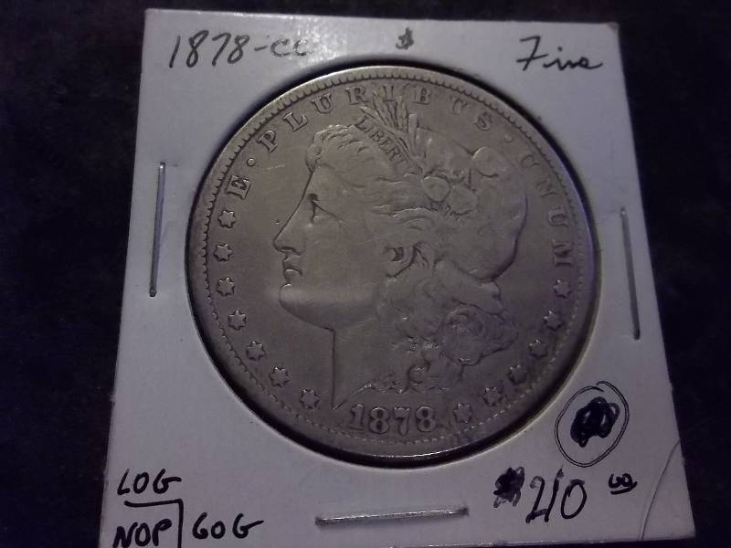 1878 CC  Morgan Silver Dollar High Dollar Value (In Fine Wholesale Grey Sheets $100.00)