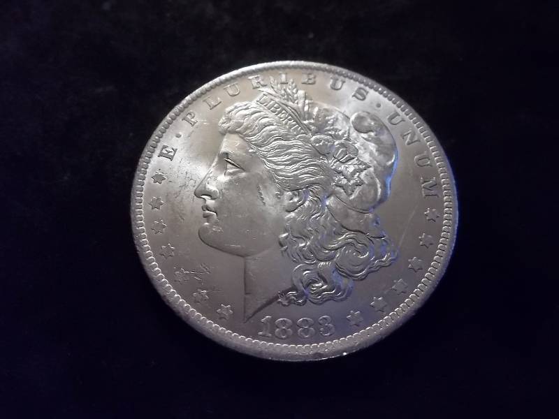 1883 O Morgan Silver Dollar High Grade MS (In MS60 $70.00)