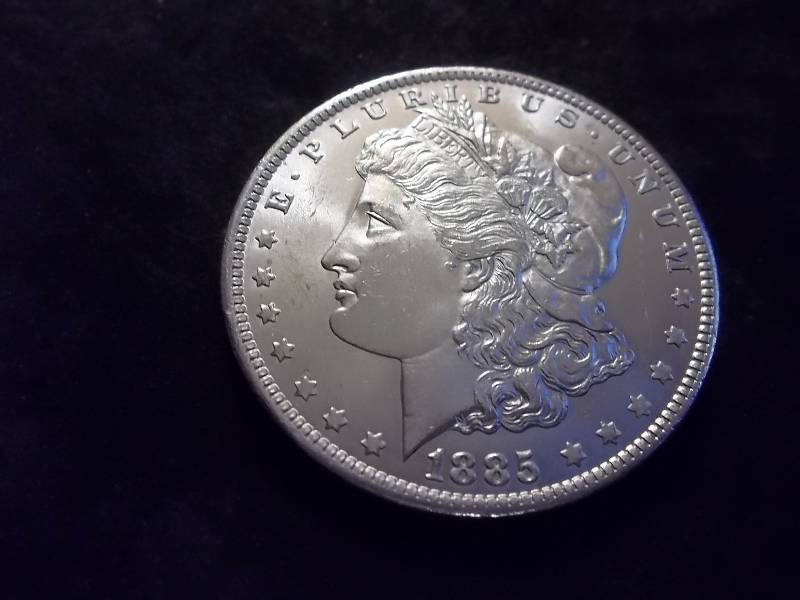 1885 O Morgan Silver Dollar High Grade MS (In MS64 Valued  $70.00) Flawless