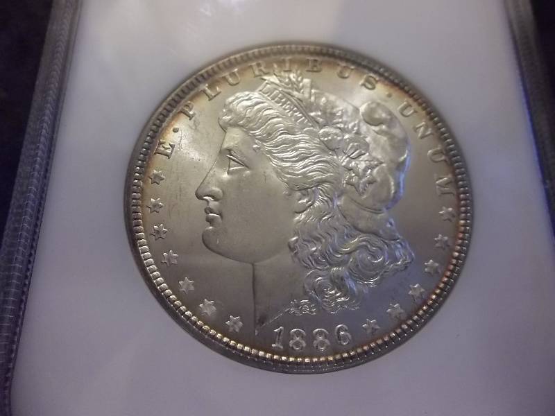 1886 Morgan Silver Dollar Very High Grade MS NGC Graded In Holder MS64