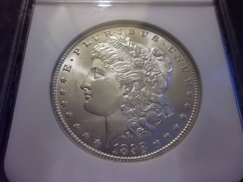 1898 O Morgan Silver Dollar  High Grade MS NGC Graded In Holder MS64 (Valued  $100.00)