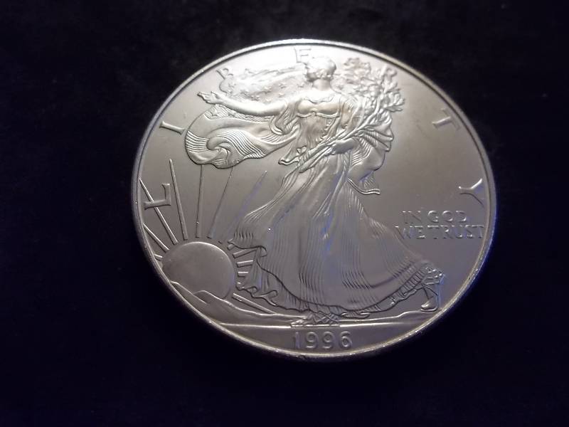 1996 US Silver Eagle 1 Oz. Pure Silver 99.9 Fine Unc (This Year Is The Rarest Of Regular Eagle Production (In MS $65.00 Wholesale Grey Sheets Value)