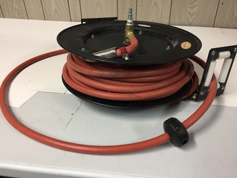 lot 56 image: Air Hose on Wheel
