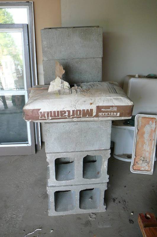lot 295 image: Concrete Bricks and Mortar