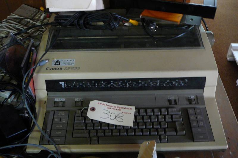 lot 308 image: Electric typerwriter, Computor Keyboard, Remotes