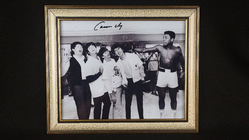 lot 2 image: Extremely Rare Cassius Clay  Beatles Autographed Photograph