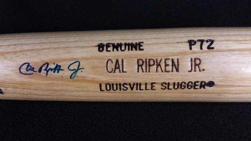 lot 14 image: Cal Ripken Jr Autographed Game Style Baseball Bat