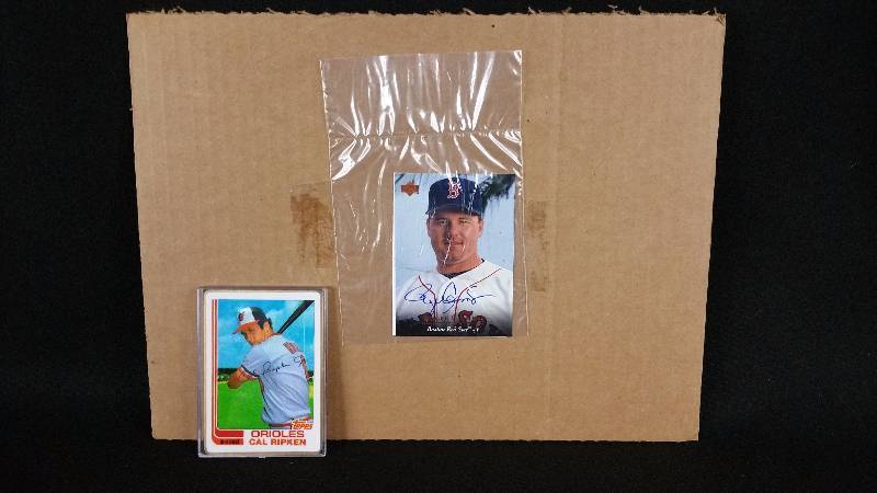 lot 23 image: Autographed Roger Clemens Card & Porcelain Cal Ripken Rookie Card