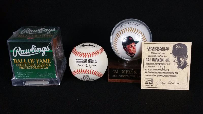 lot 28 image: Cal Ripken Jr Commemorative Baseballs  Display