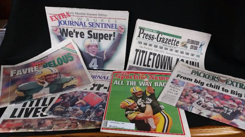 lot 73 image: Group of Brett Favre  Packers Championship Newspapers