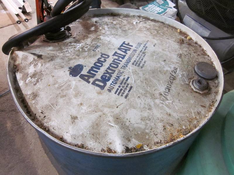 Barrel With ATF, Pump & a Storage Tank