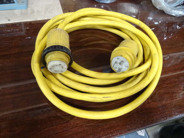 lot 74 image: RV Extension Cord. 103 .25.