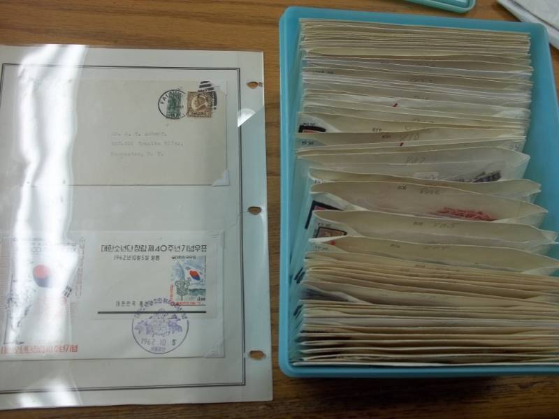 lot 21 image: First Day Issue Stamps with Large Shoe box tote of Sorted by Stamp Number marked 782-864