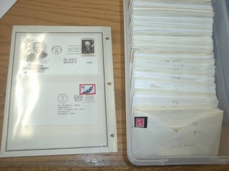 lot 22 image: First Day Issue Stamps with Large Shoe box tote of Sorted by Stamp Number marked 219-807