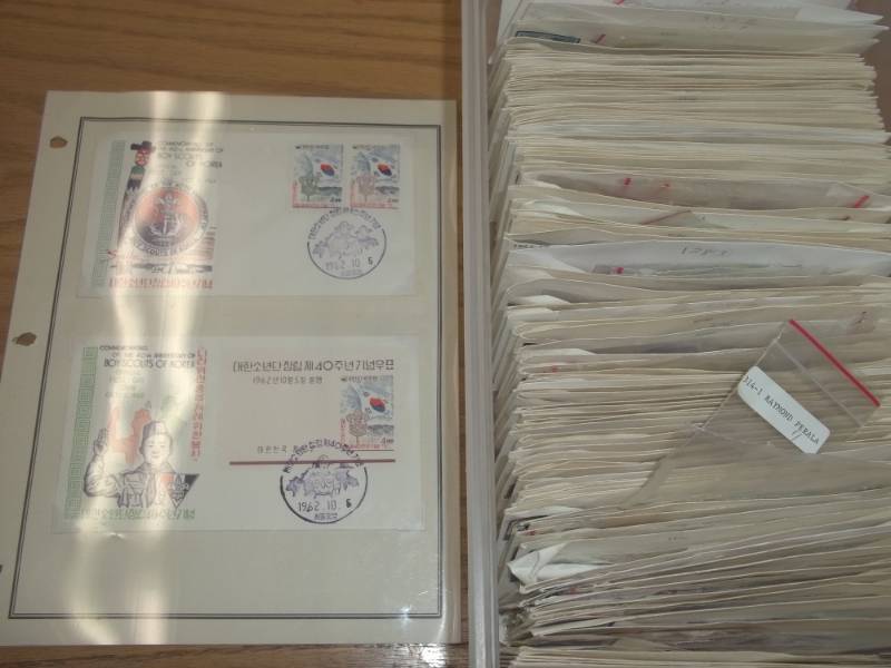 lot 25 image: First Day Issue Stamps with Large Shoe box tote of Sorted by Stamp Number marked 1077-1338