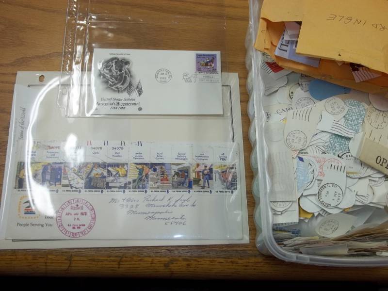 lot 30 image: First Day Issue Stamps with Large Shoe box tote of Assorted Postmarks