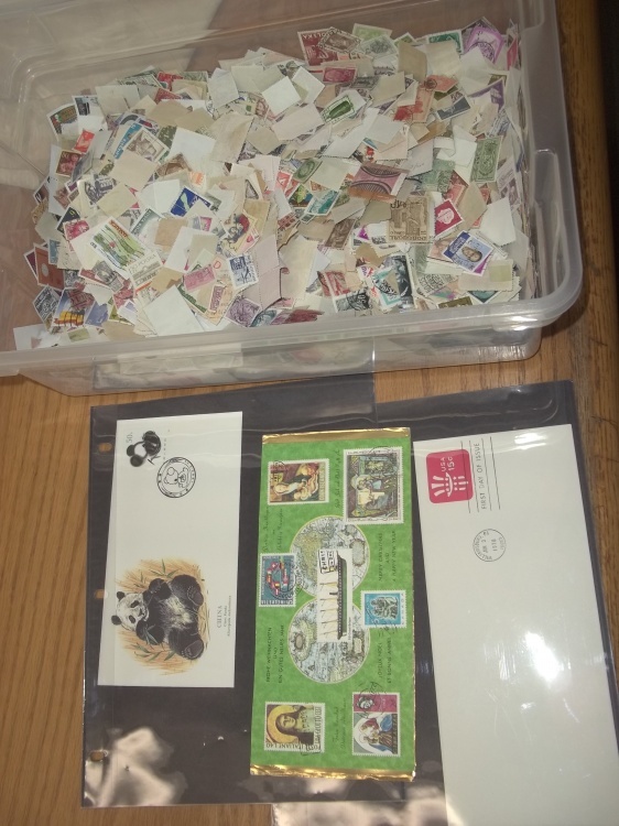 lot 34 image: First Day Issue Stamps with Large Shoe box tote of Assorted Stamps