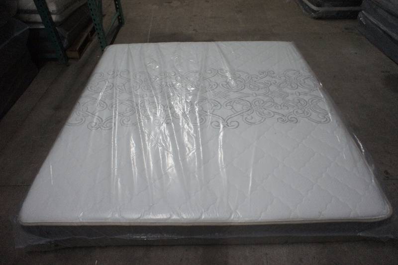 lot 22 image: New - King Size Sealy - Newfield Cushion Firm  - Mattress - MSRP $ 1899.99