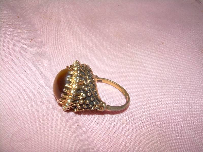 SZ 6 RING TOP STONE IS BROWN