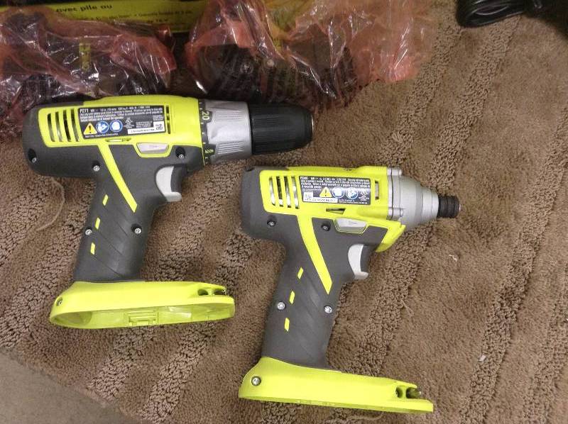 lot 81 image: Ryobi One 18V drill driver and impact drill kit includes 2 batteries and charger not used