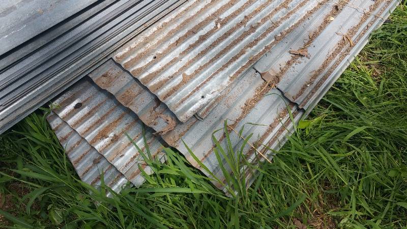 lot 12 image: Huge Pile of 10 2 & Smaller Galvanized Steel Sheet