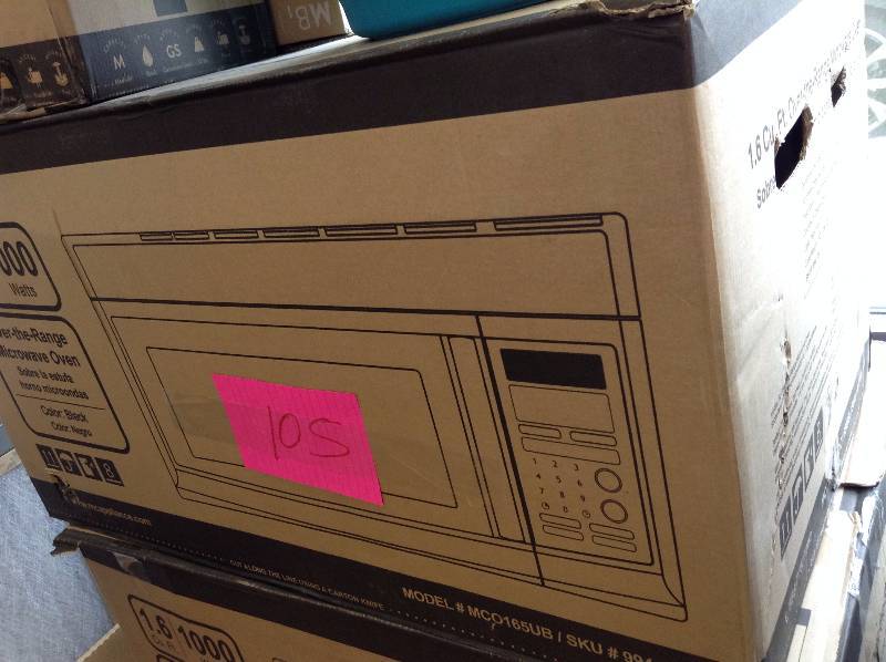 lot 105 image: Magic Chef Over the Range Microwave Model MCO165UB not used