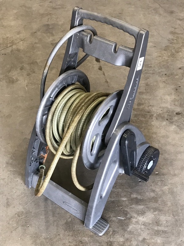 lot 24 image: Garden Hose Reel With Hose