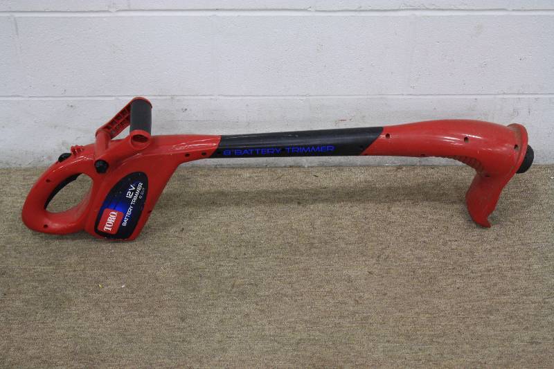lot 97 image: Toro 12V 8 Battery Trimmer