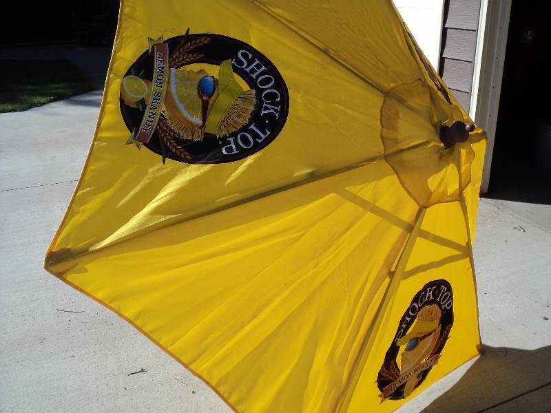 lot 16 image: shock-top yellow umbrella 80in diam...