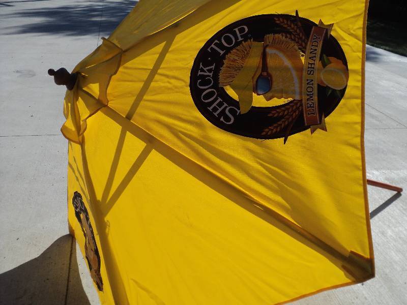 lot 17 image: shock-top yellow umbrella 80in diam...