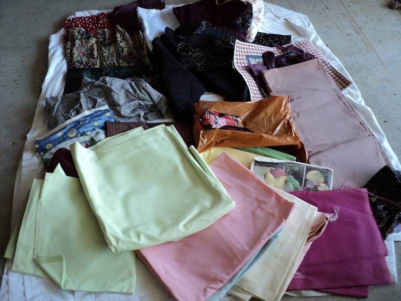 lot 35 image: box of material and vouge pattern...