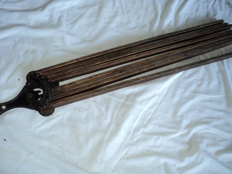 lot 56 image: vintage cast iron and wood towel ra...