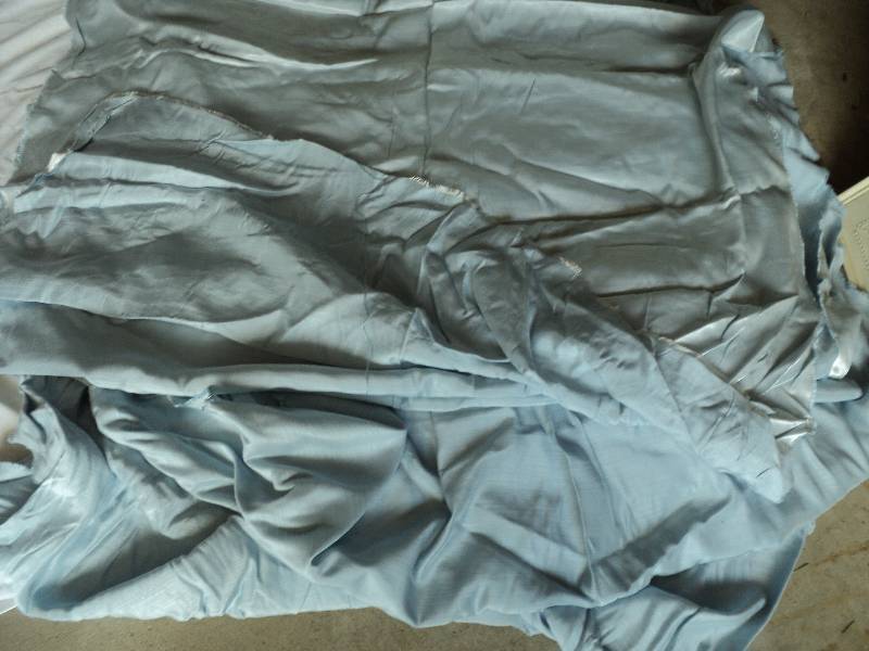 lot 68 image: 14 pus yards of blue material...
