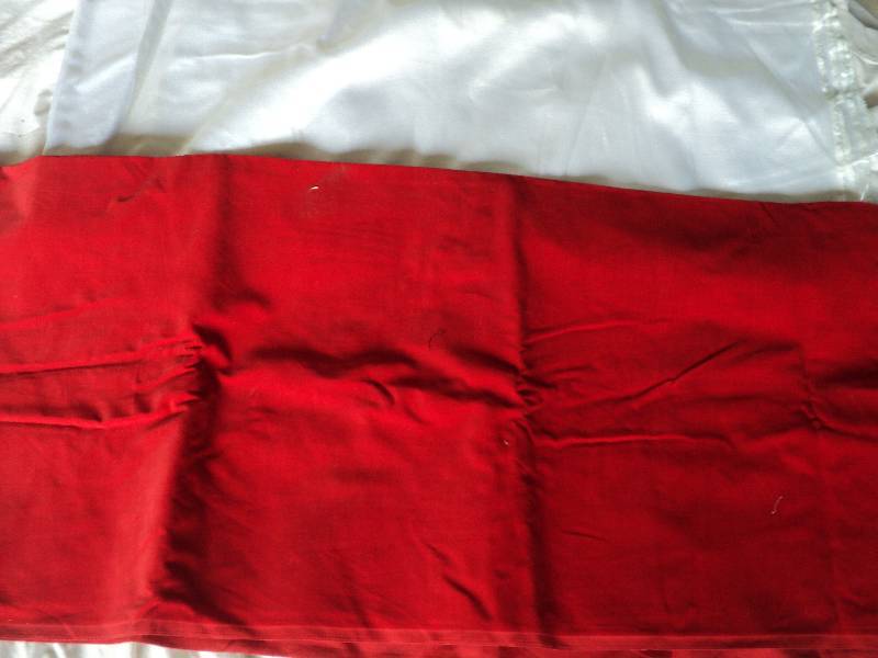 lot 69 image: white linen and red velvet material...