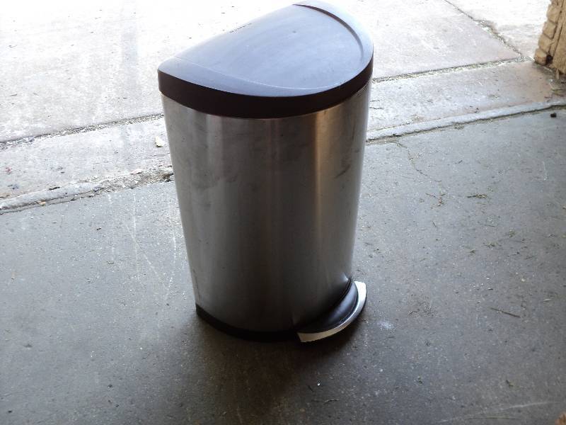 lot 79 image: simple human garbage can...