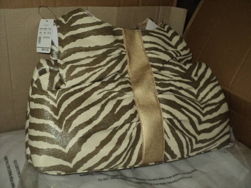 lot 83 image: box of 12 new CJ Banks purses, each...