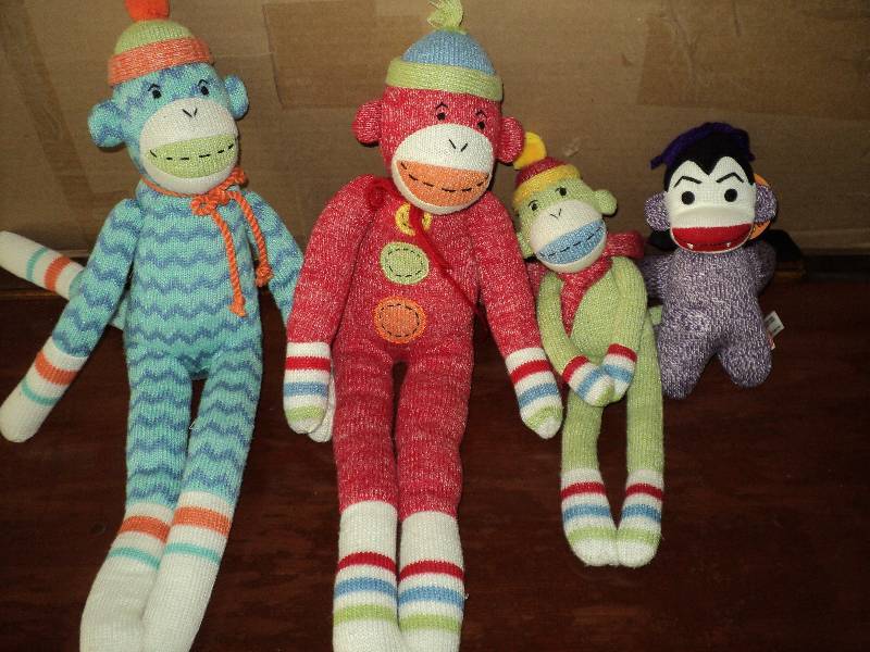 lot 106 image: sock monkey stuffed animals...