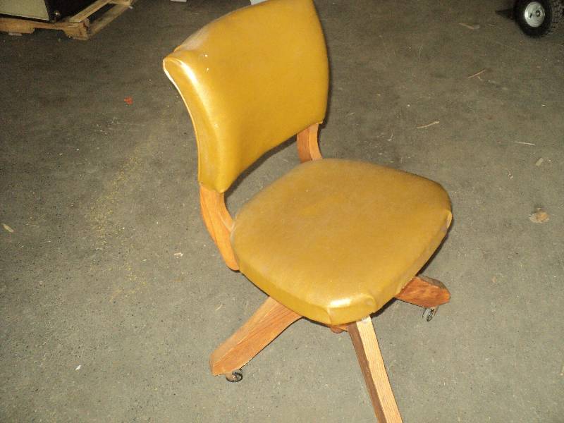 lot 122 image: oak vintage office chair on wheels...