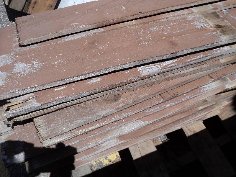 lot 168 image: 40 stained brown fence, boards are ...