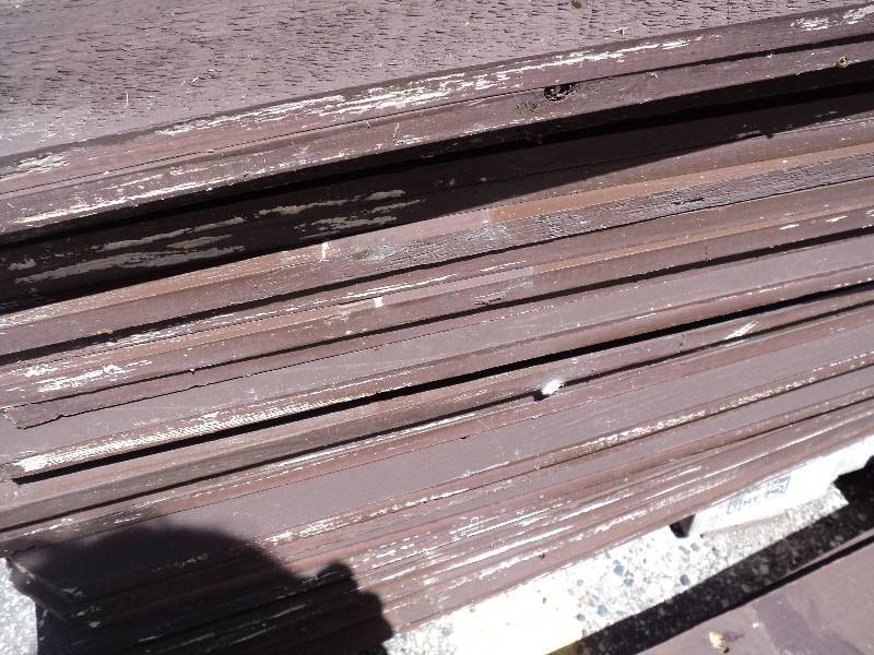 lot 169 image: 50 brown painted dog eared fence bo...