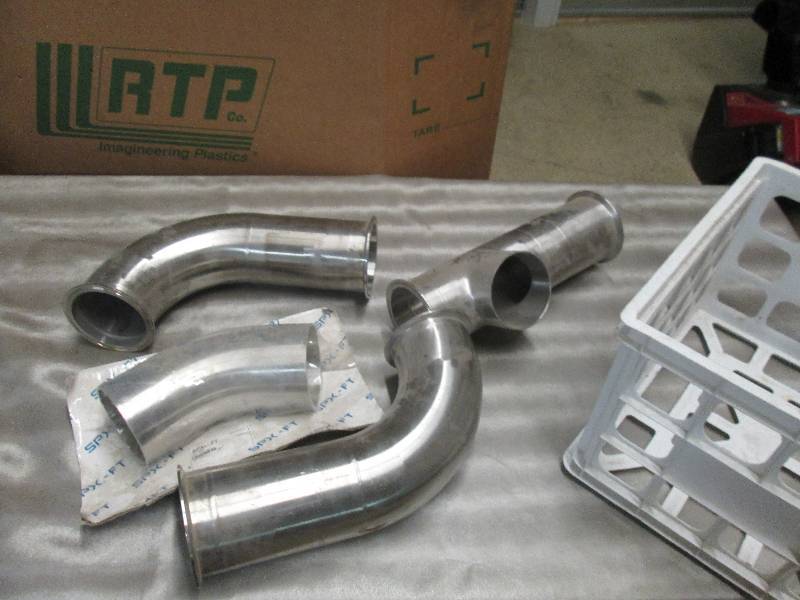 lot 11 image: Lot of 4 exhaust Pipes in Plasti...