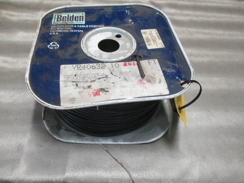 lot 28 image: Spool of Belden Communication Cable...