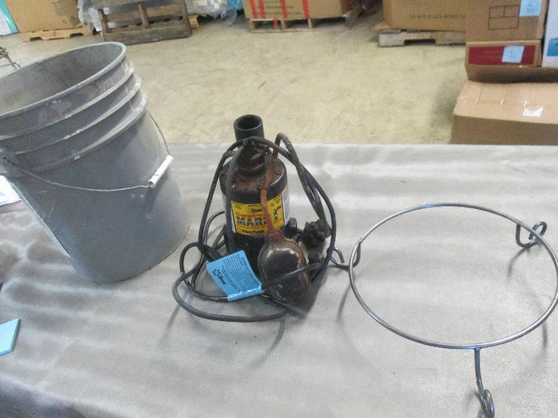 lot 54 image: Sump Pump in Bucket...