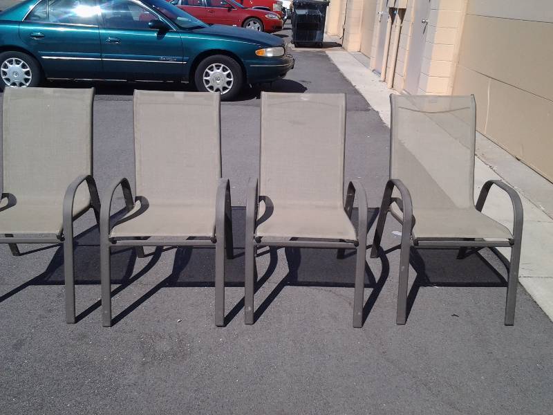 lot 23 image: 4-Stackable Patio Chairs